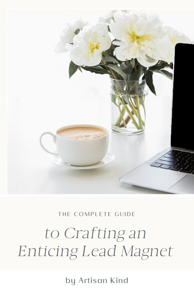 Cup of coffee, bouquet of flowers and a lap top on white desk above the words "The Complete Guide to Crafting an Enticing Lead Magnet"