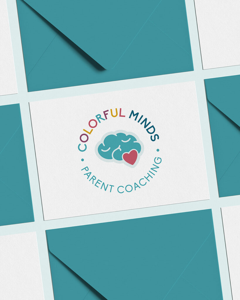Note card with Colorful Minds logo surrounded by envelopes