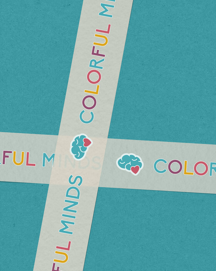 Taping with Colorful Minds logo on blue paper