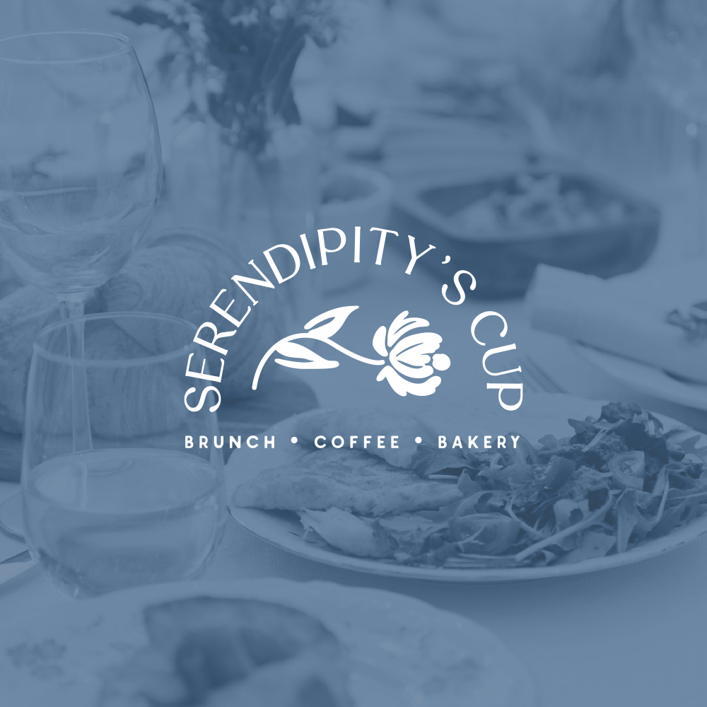 Charming, white, floral logo for Serendipity's Cup emblazoned against a peaceful blue background.